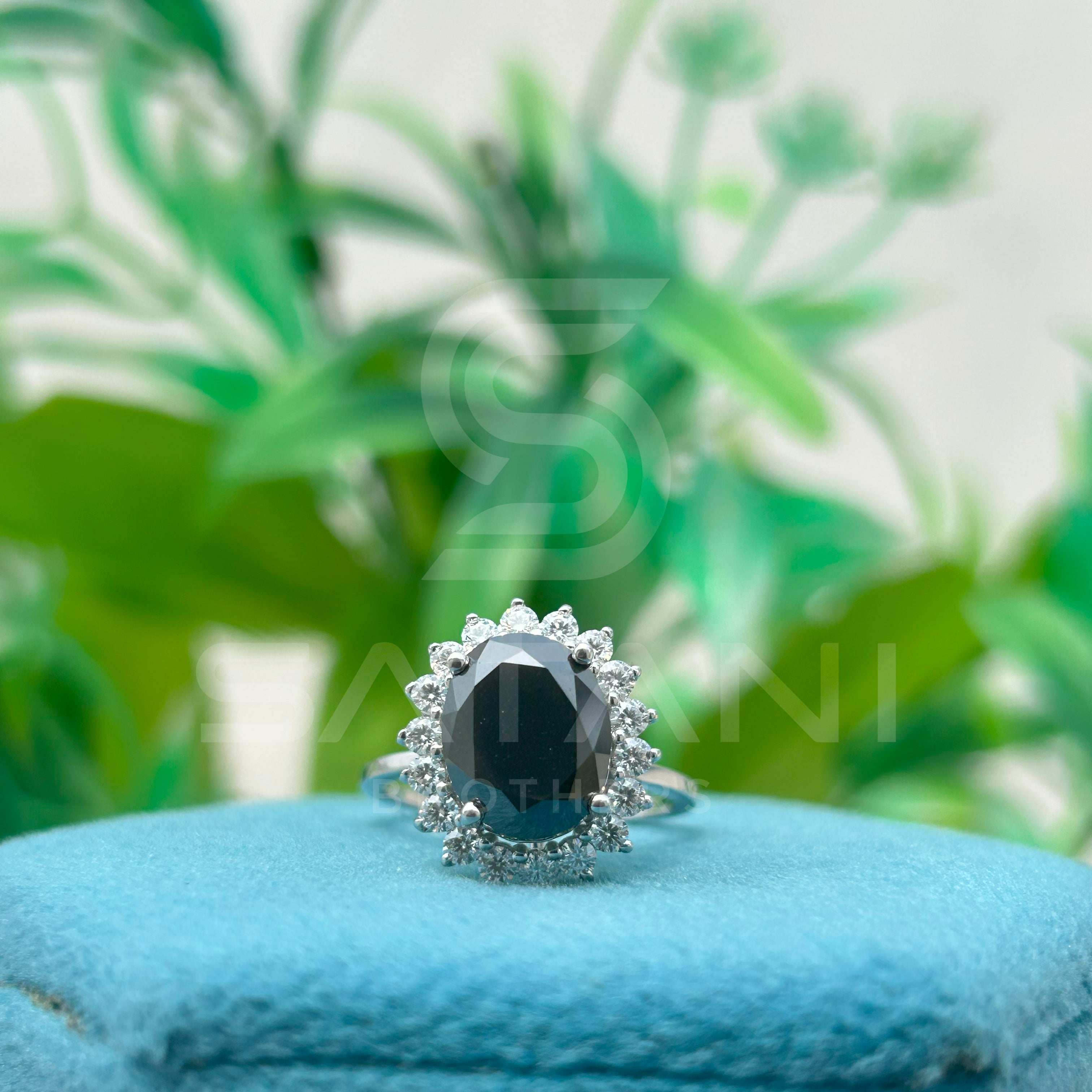 "Oval Black Diamond Halo Ring in White Gold"