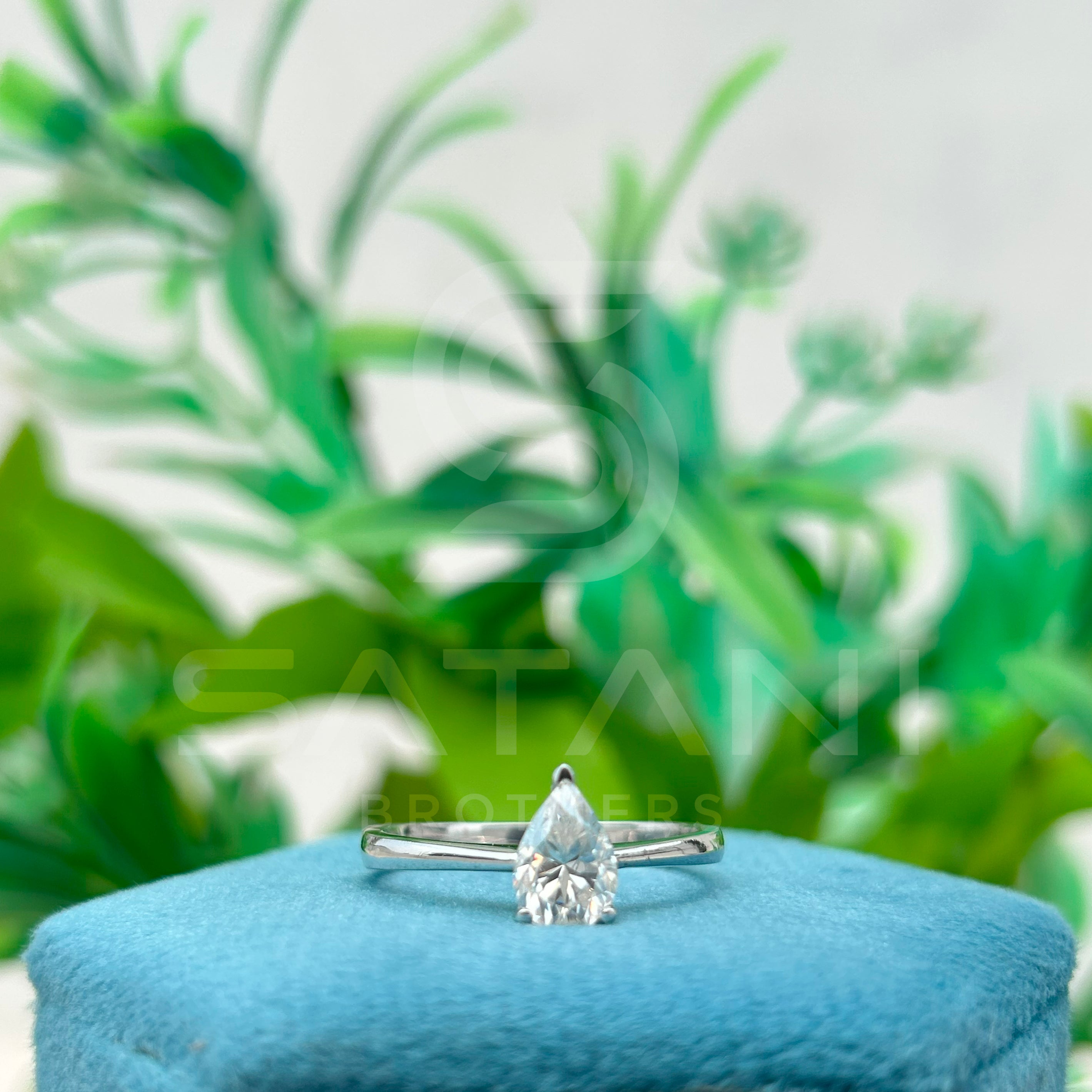 Elegant Pear-Cut Diamond Solitaire Ring in Sleek White Gold