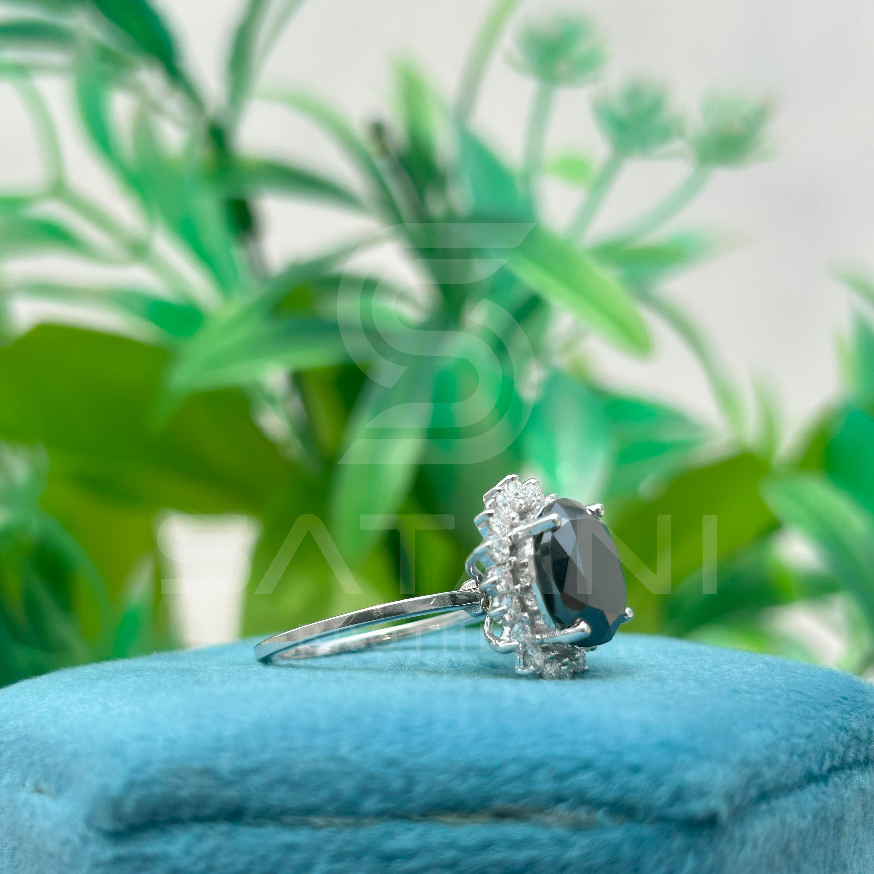 "Oval Black Diamond Halo Ring in White Gold"