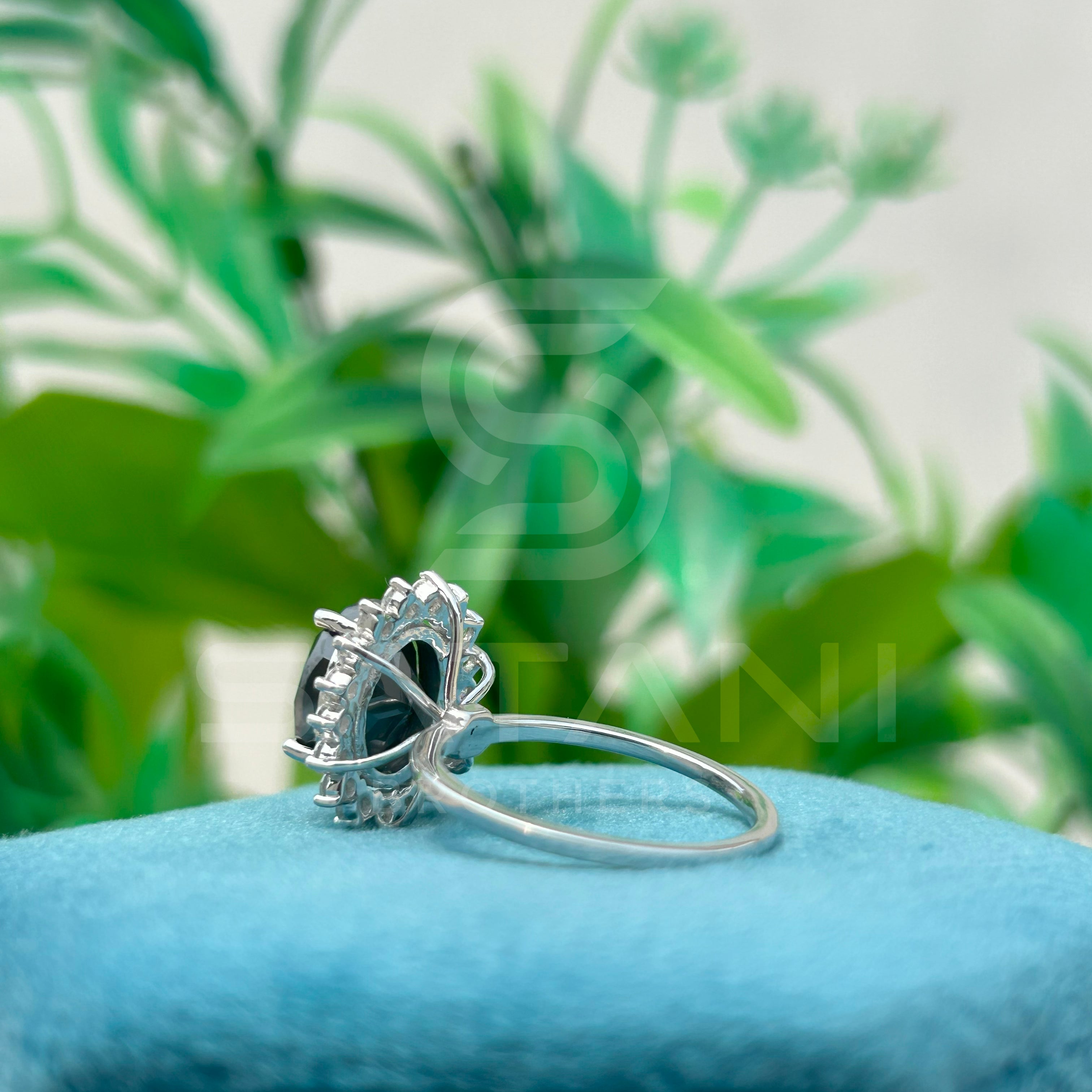 "Oval Black Diamond Halo Ring in White Gold"