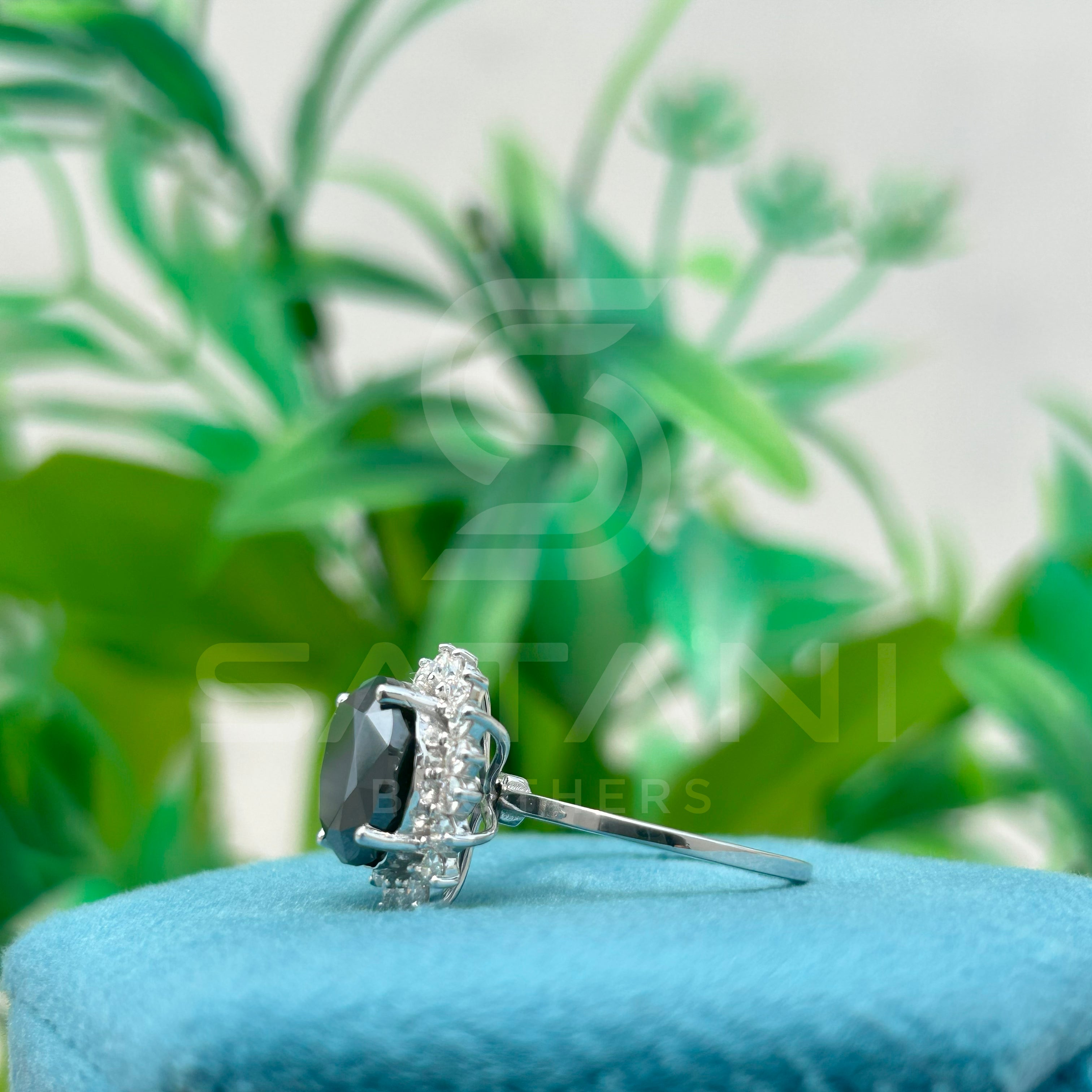 "Oval Black Diamond Halo Ring in White Gold"