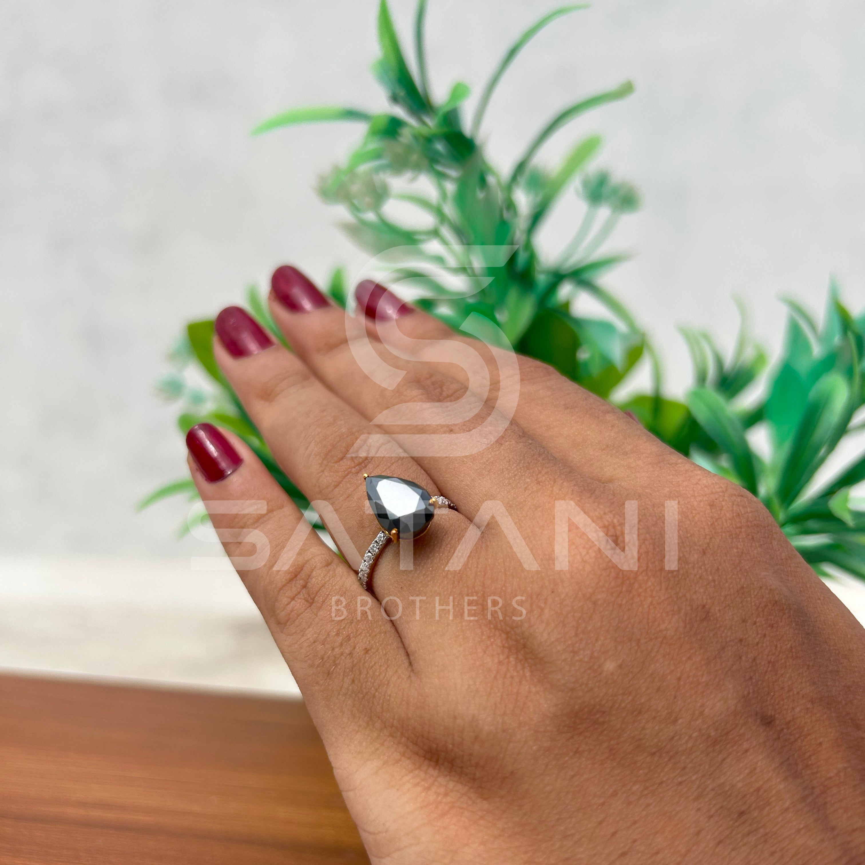 “Pear Shape Black Diamond Engagement Ring with Pave Band”