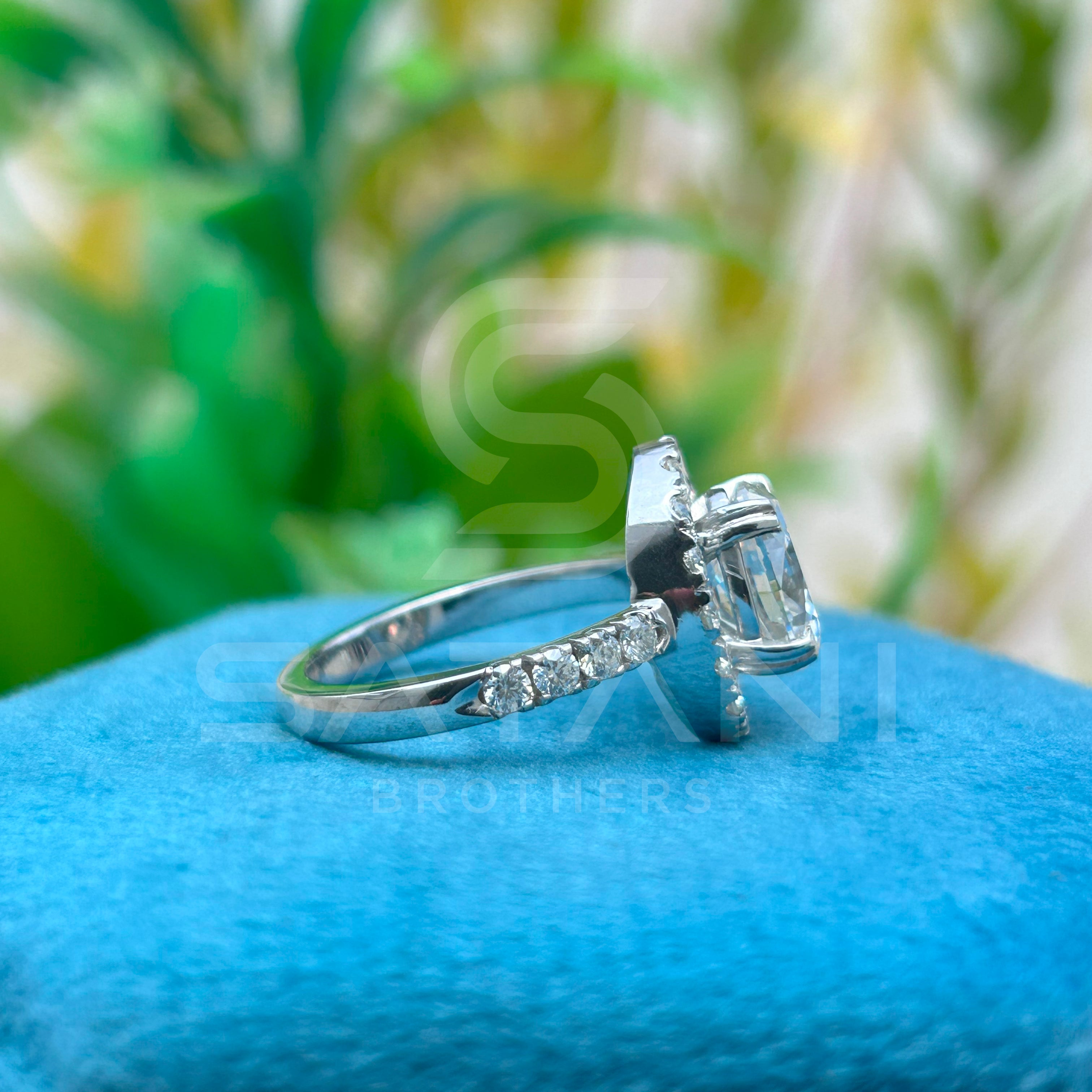 "Oval Cut Diamond Halo Engagement Ring in White Gold – Classic Oval Solitaire with Pave Band"