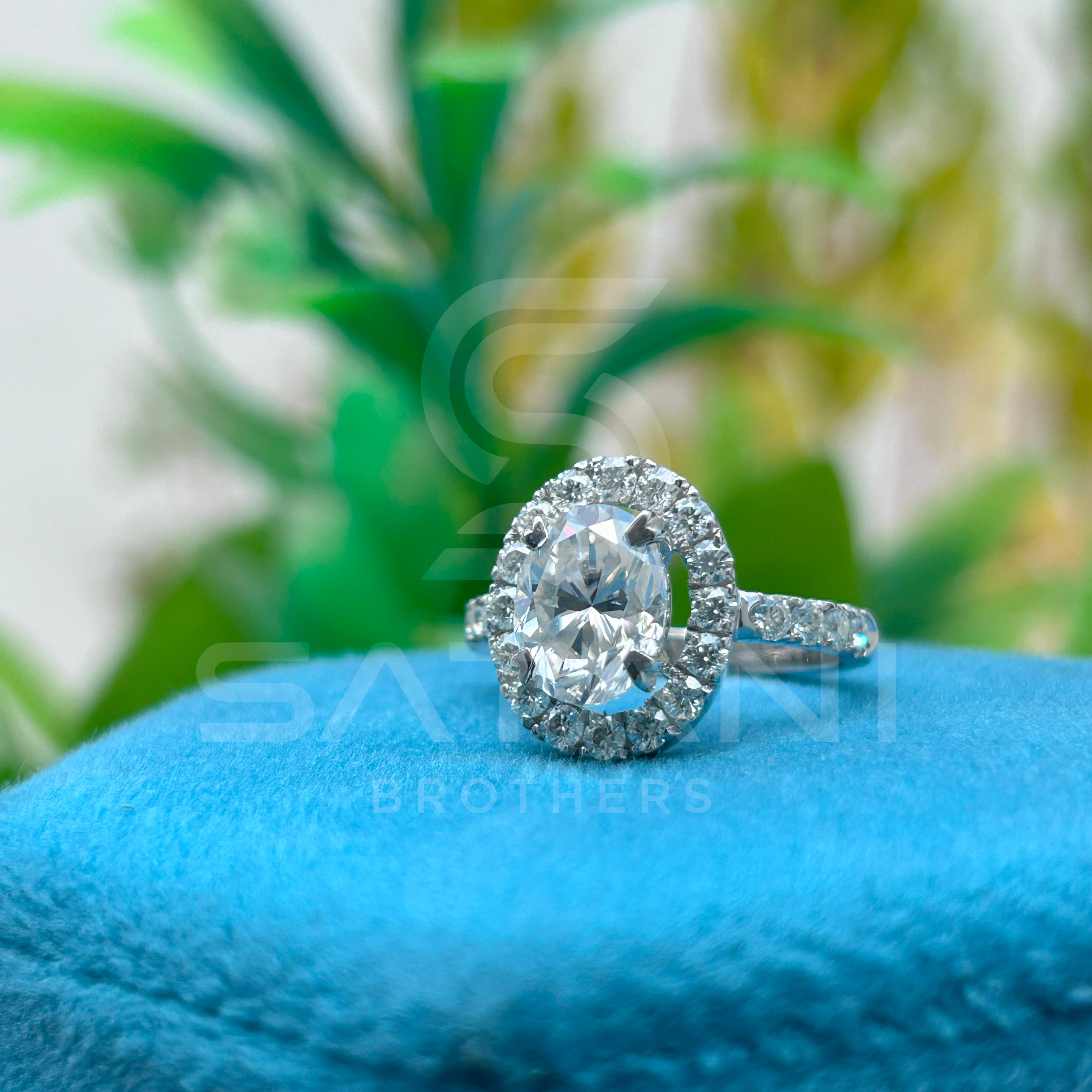 "Oval Cut Diamond Halo Engagement Ring in White Gold – Classic Oval Solitaire with Pave Band"