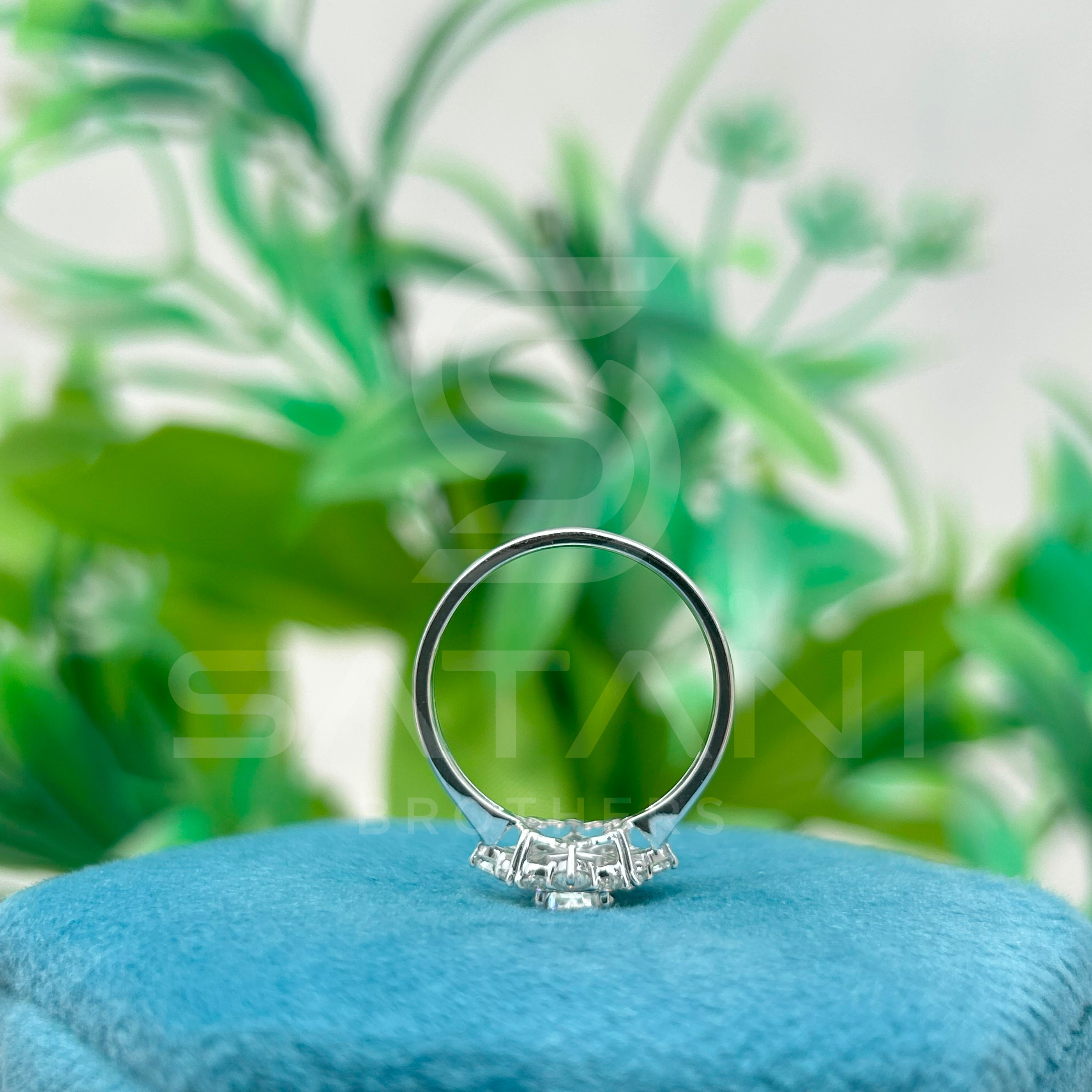 Round Brilliant Cut Diamond Floral Halo Engagement Ring in White Gold