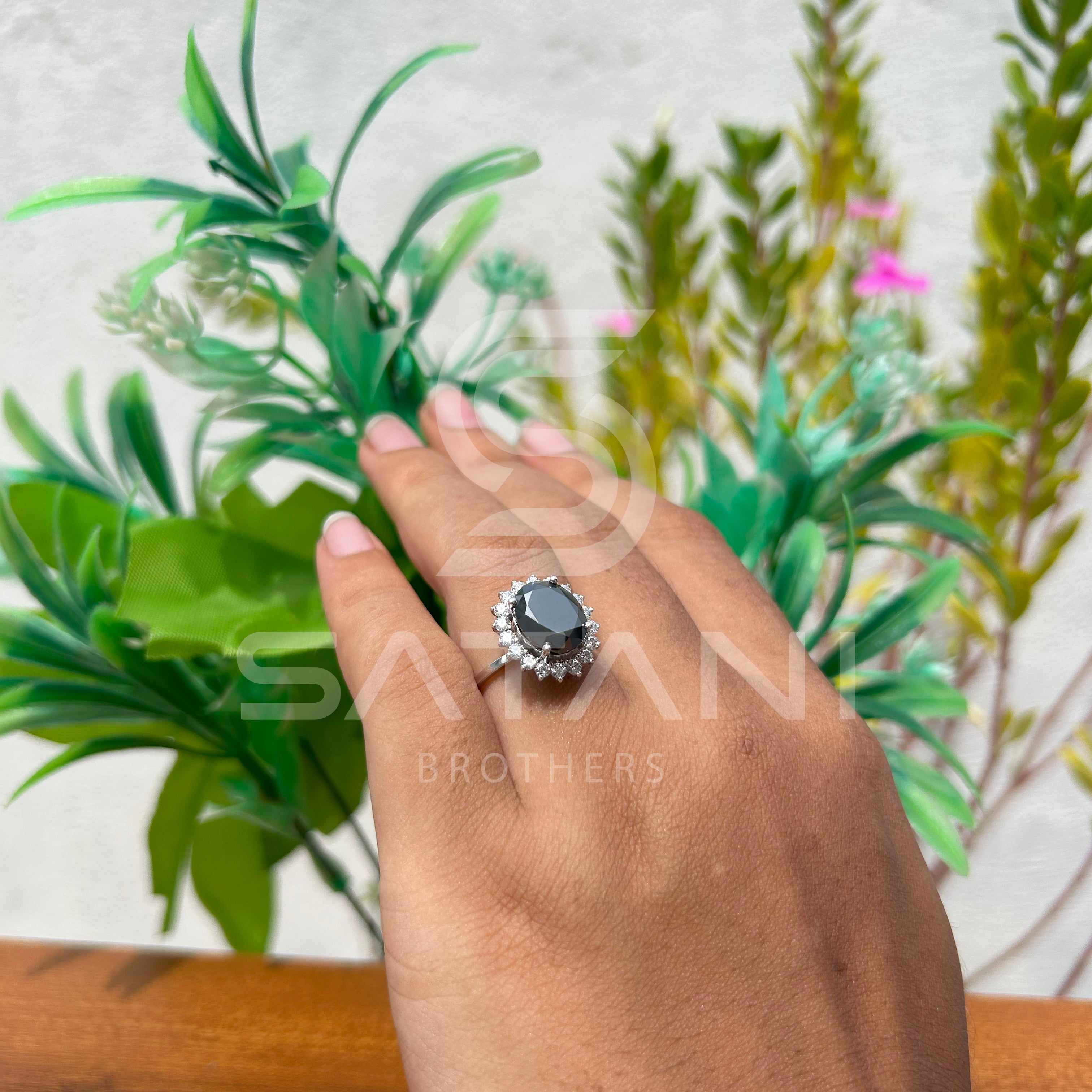 "Oval Black Diamond Halo Ring in White Gold"