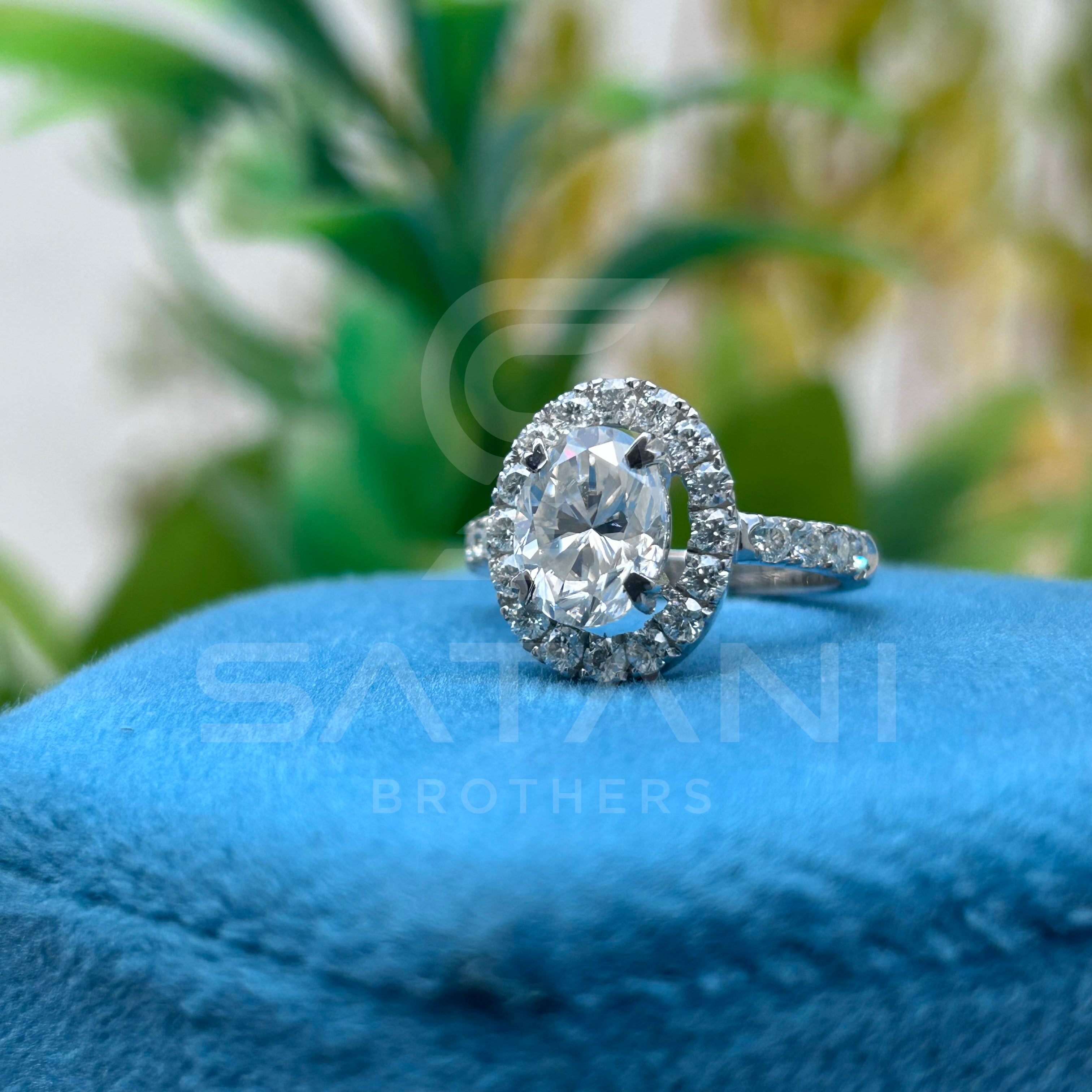 "Oval Cut Diamond Halo Engagement Ring in White Gold – Classic Oval Solitaire with Pave Band"