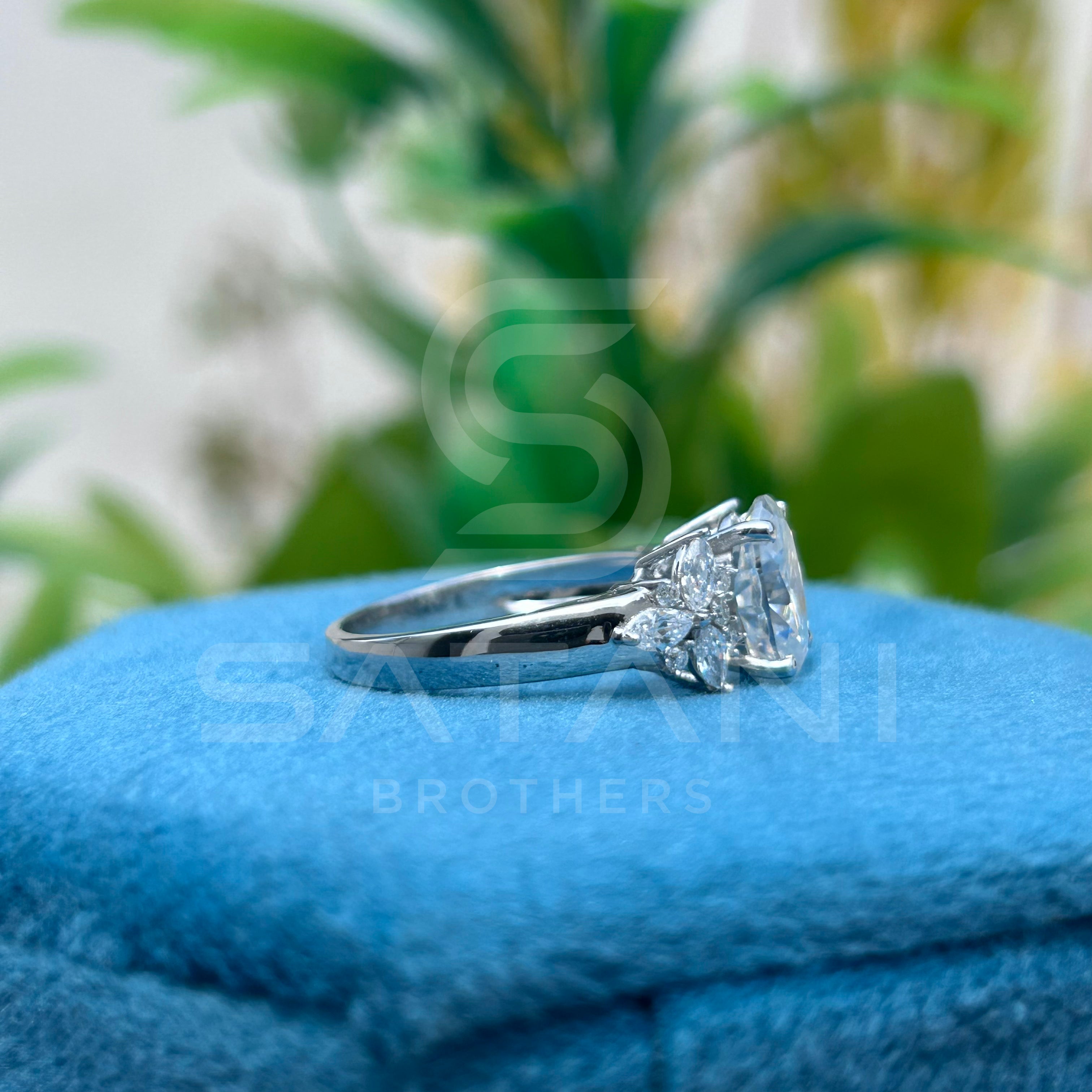Classic oval Moissanite Diamond Ring– Trio Side Stone Setting
