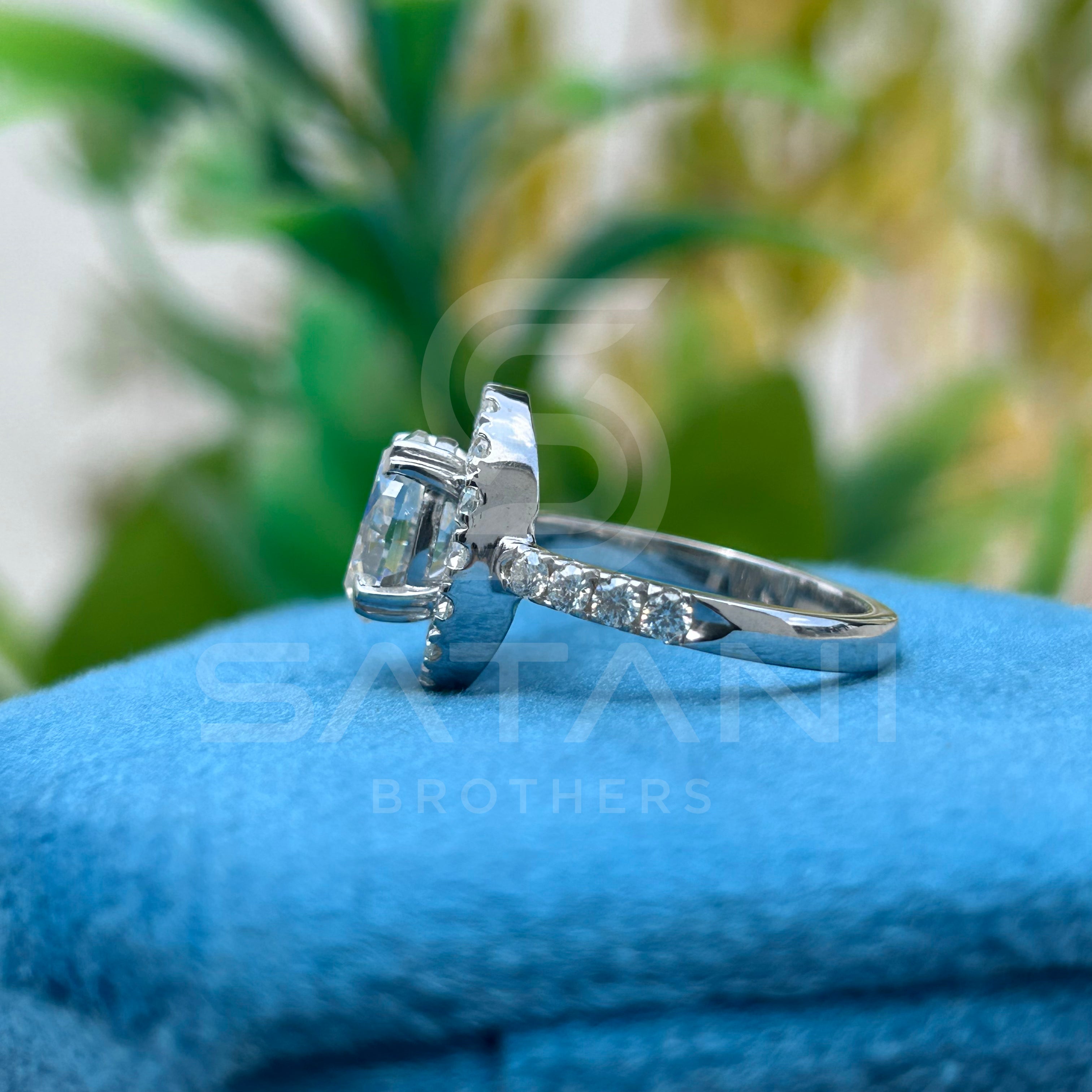 "Oval Cut Diamond Halo Engagement Ring in White Gold – Classic Oval Solitaire with Pave Band"
