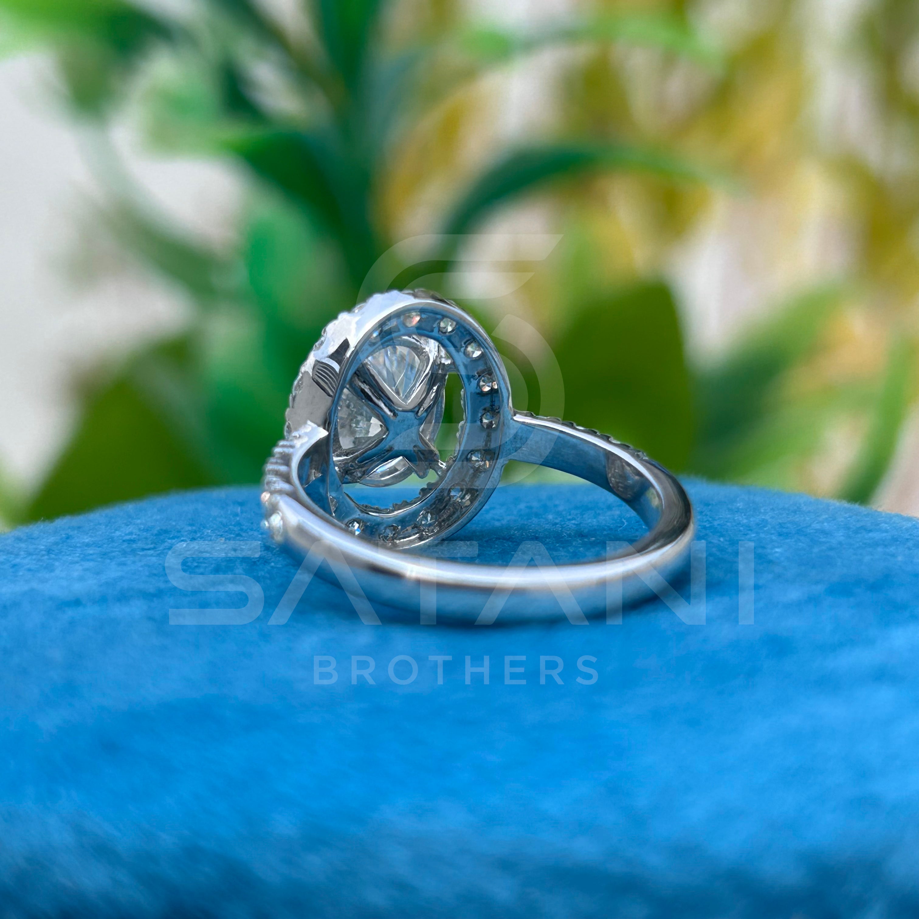 "Oval Cut Diamond Halo Engagement Ring in White Gold – Classic Oval Solitaire with Pave Band"