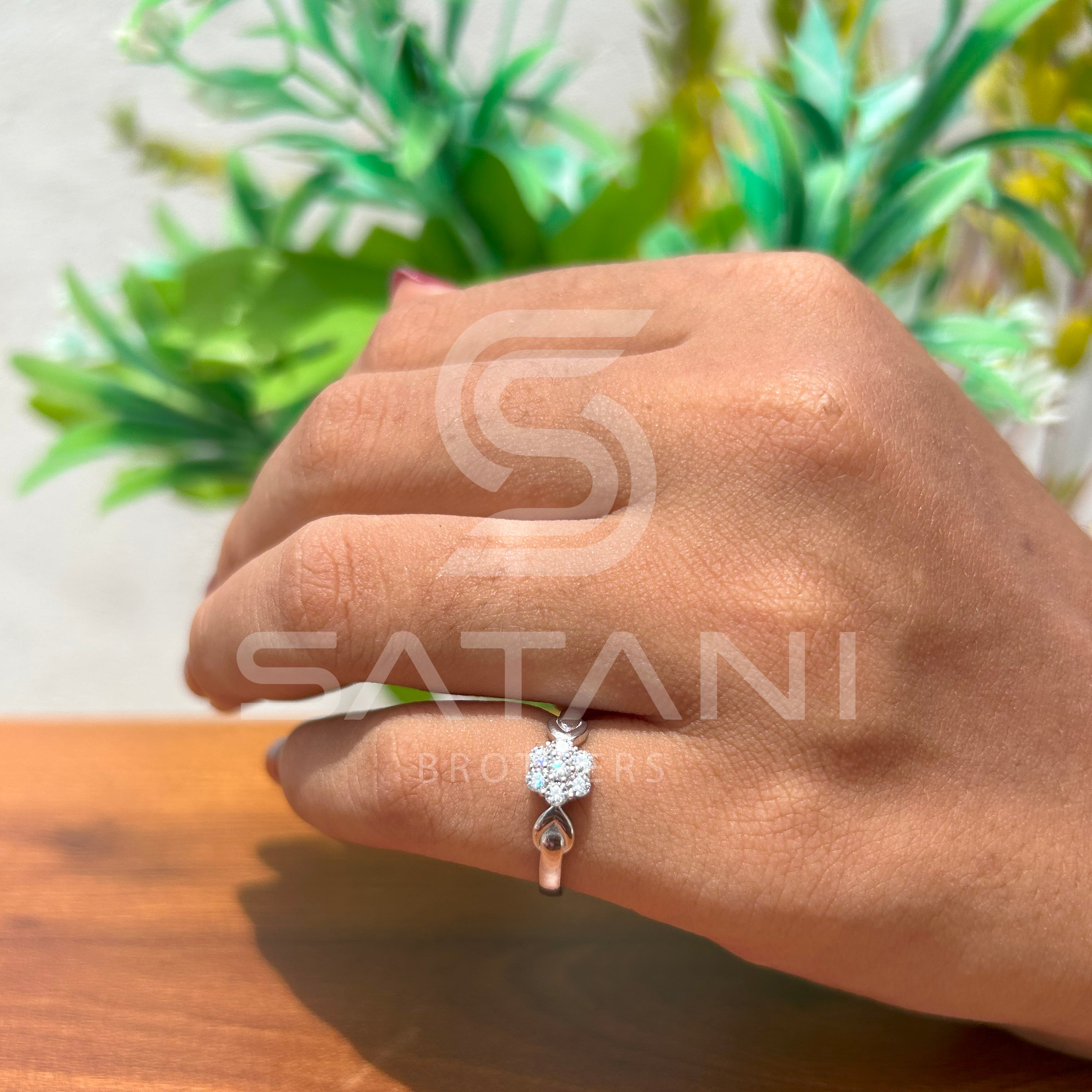 White Gold Diamond Cluster Ring with Twisted Shoulder Design – Elegant & Timeless