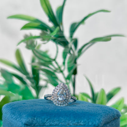 "Pear Cut Moissanite Engagement Ring – Double Halo Sparkling Design"