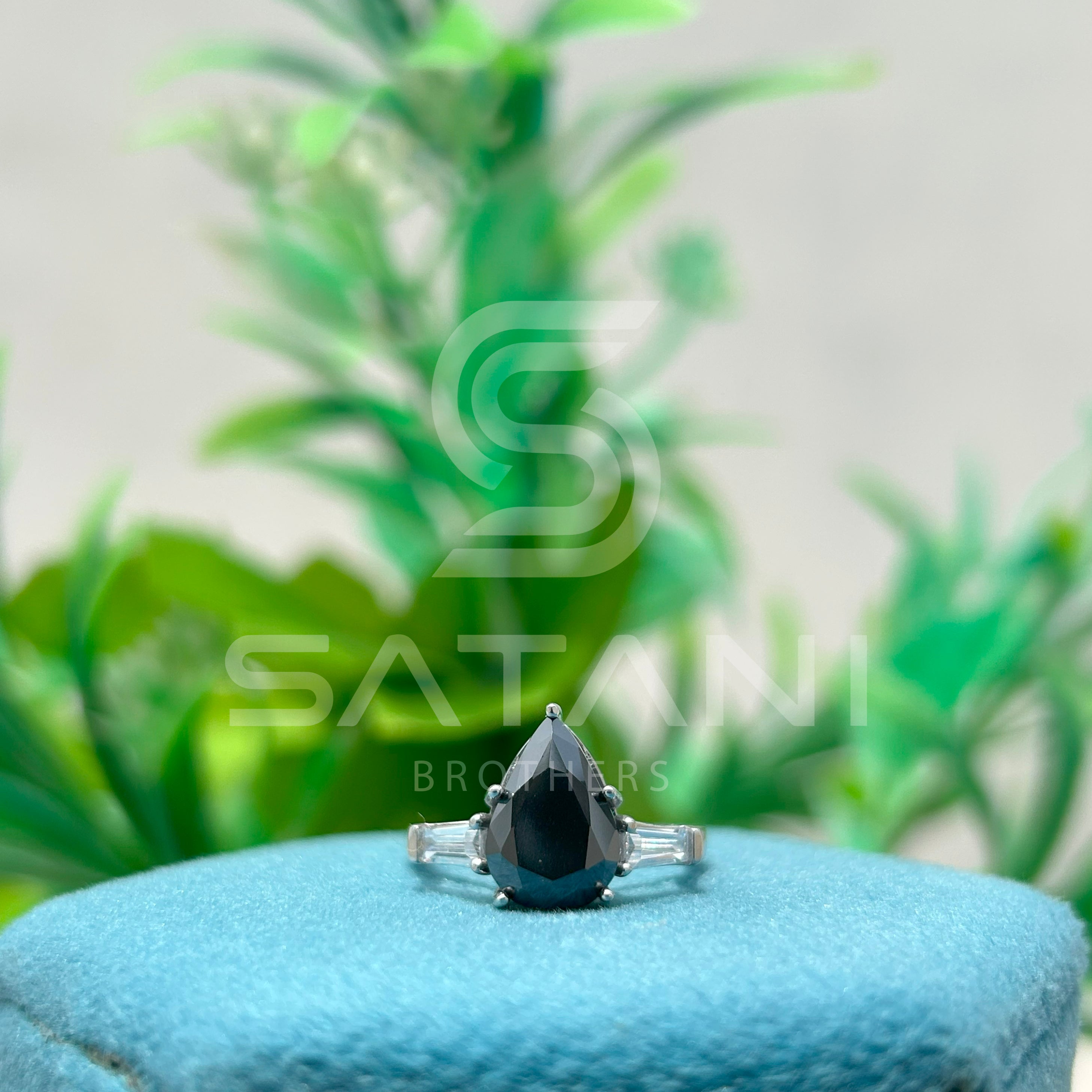 Pear Shape Black Diamond Three Stone Engagement Ring with Baguette Side Stones