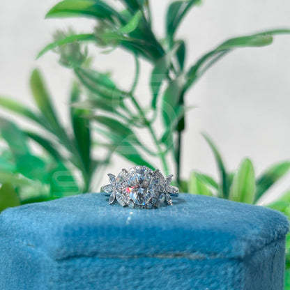 Oval Moissanite Floral Halo Engagement Ring – Marquise Petal Accents on Classic Shank