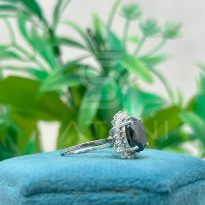 "Oval Black Diamond Halo Ring in White Gold"