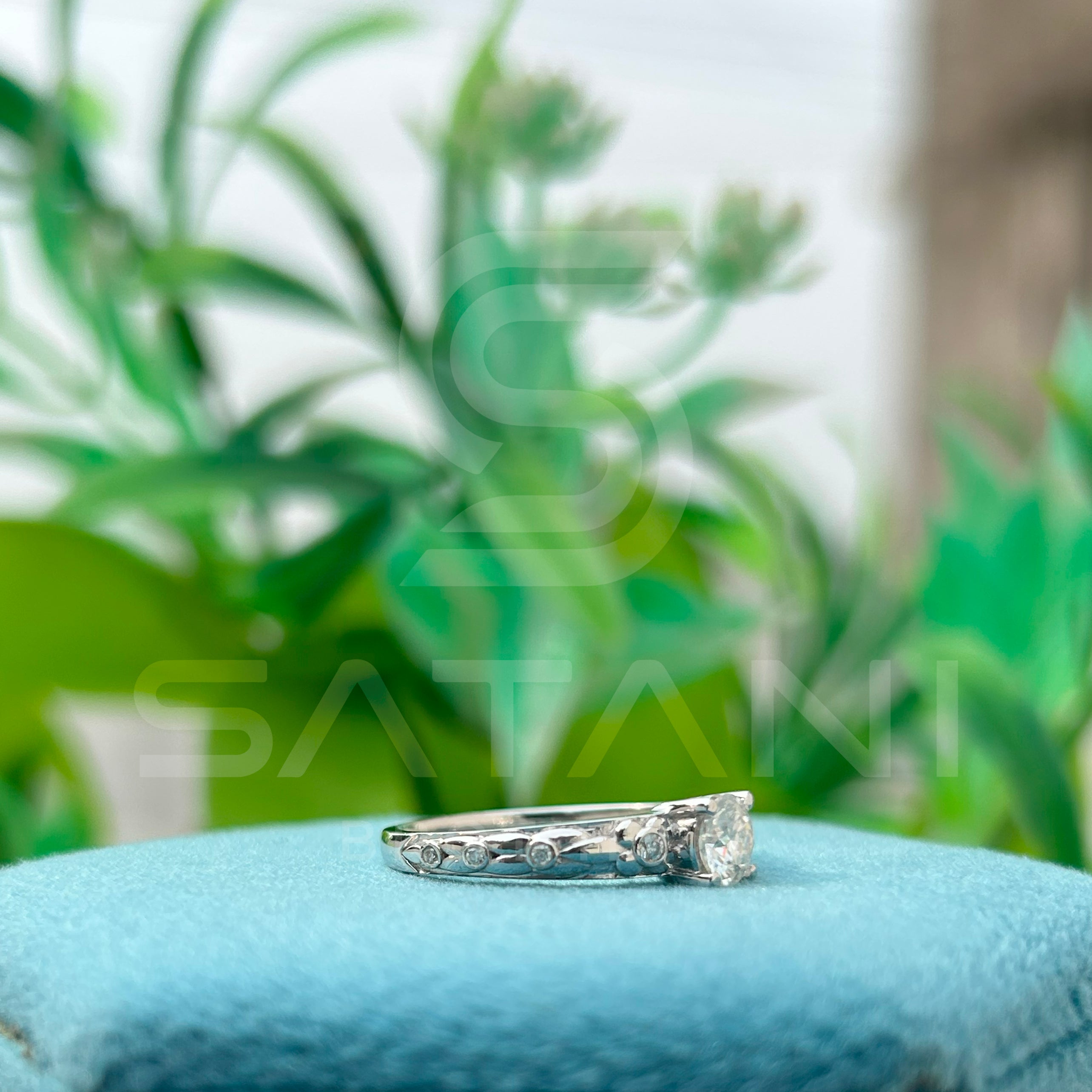 "Round Cut Solitaire Ring with Side Accents – Elegant Engagement Design"