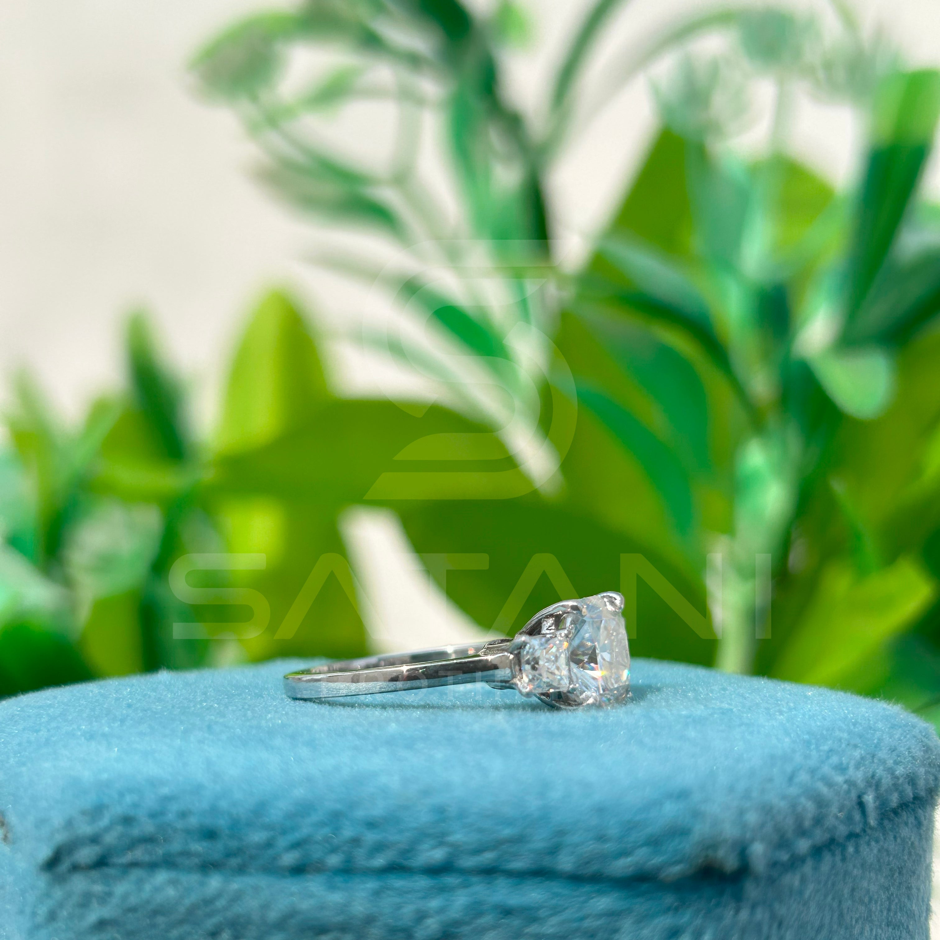 cushion Cut Diamond Three Stone Engagement Ring with Princess Cut Side Stones