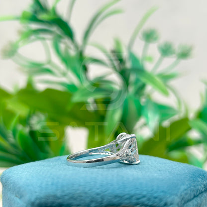 "Emerald Cut Moissanite Engagement Ring with Side Accents in Sterling Silver"