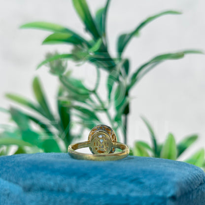 Round Diamond Leaf Halo Ring in Yellow Gold