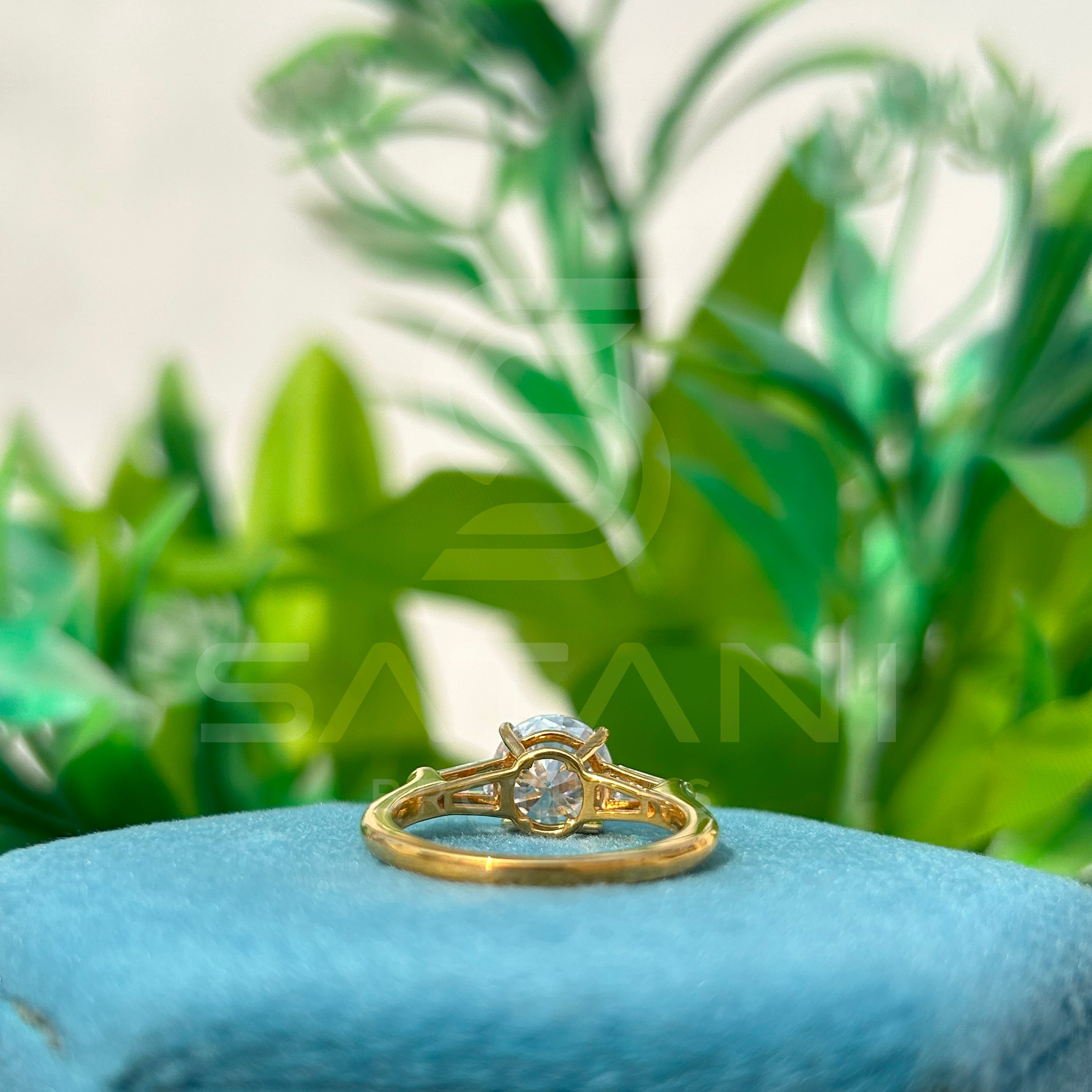 Round Brilliant Cut Diamond Engagement Ring with Baguette Side Stones