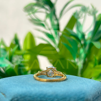 Round Brilliant Cut Diamond Engagement Ring with Baguette Side Stones