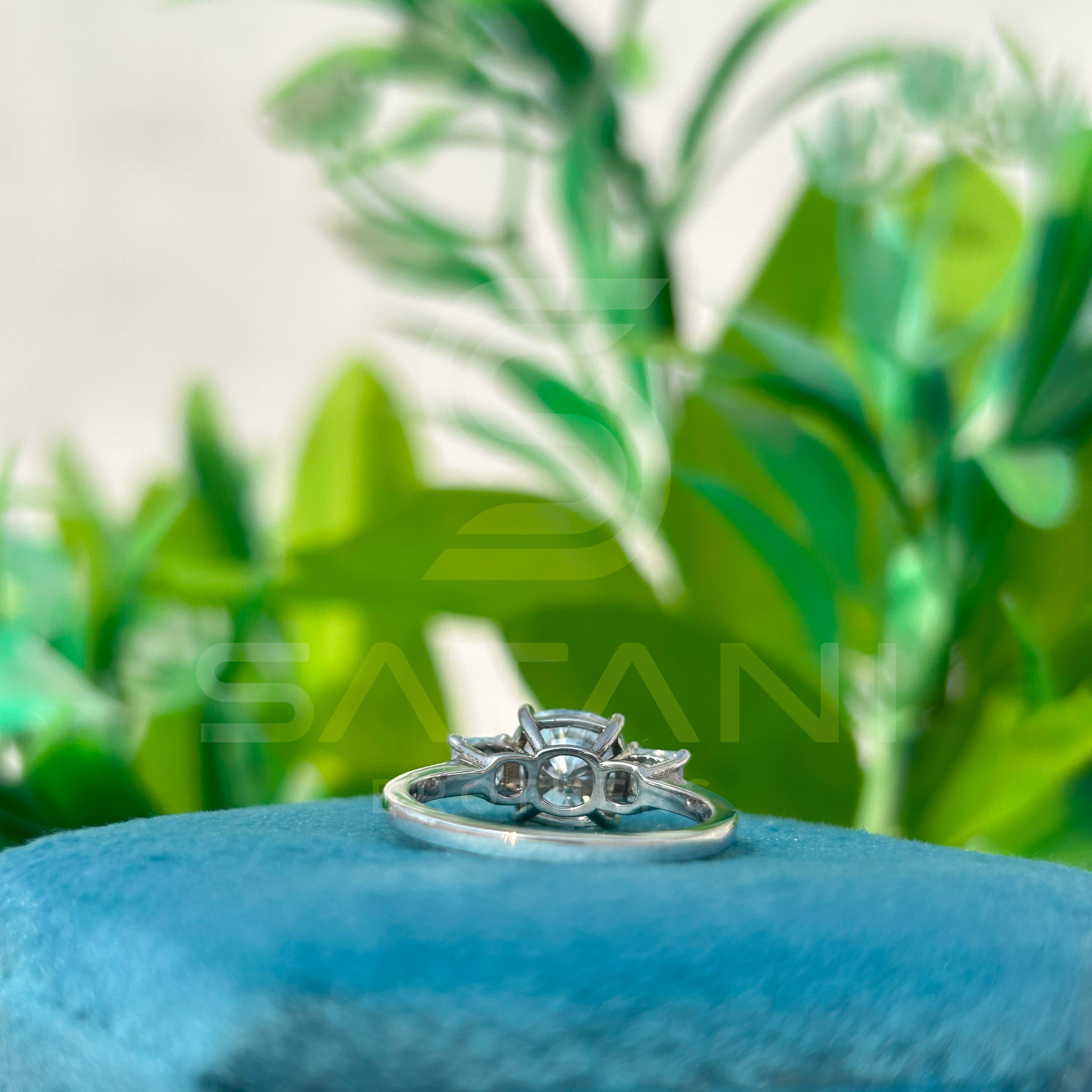 cushion Cut Diamond Three Stone Engagement Ring with Princess Cut Side Stones