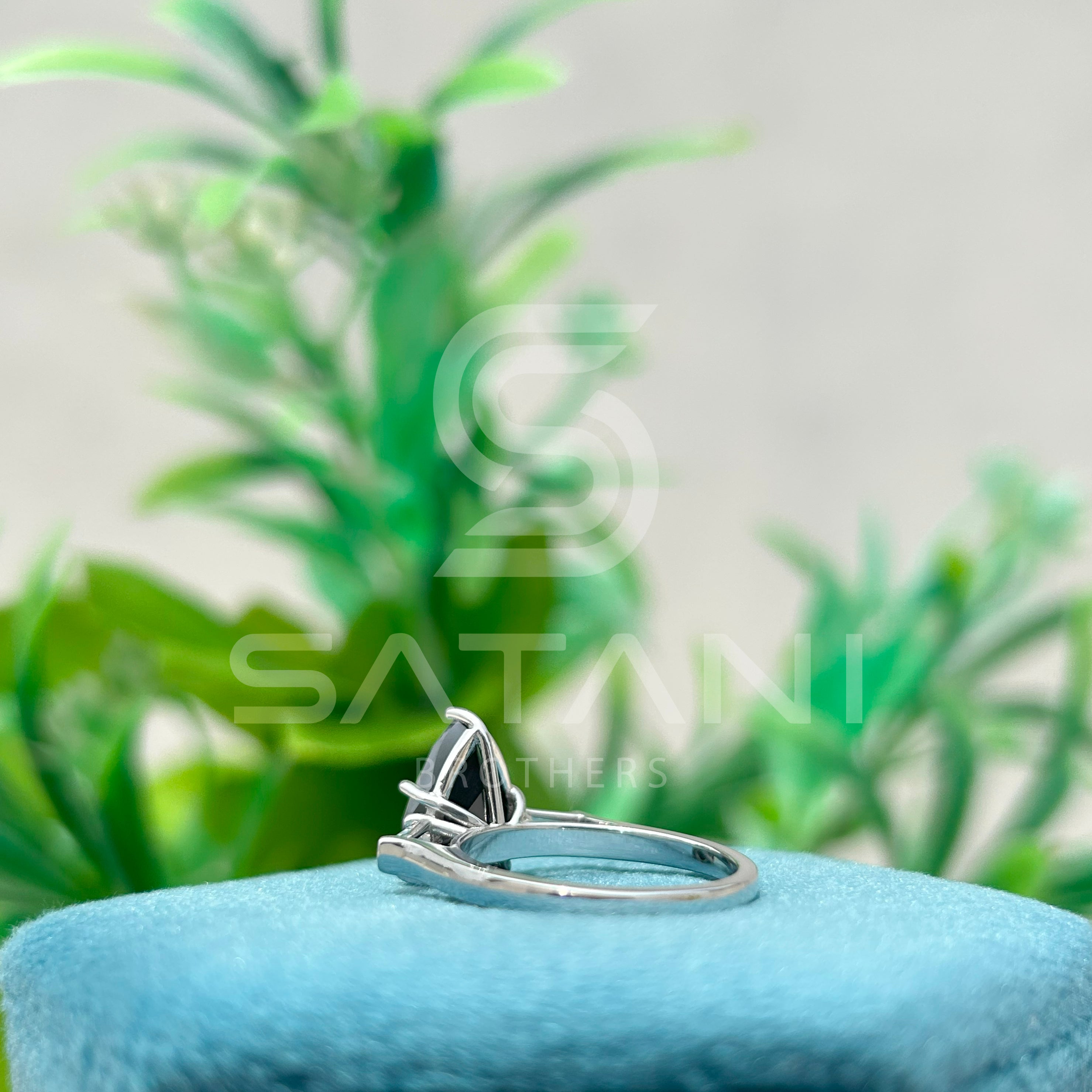 Pear Shape Black Diamond Three Stone Engagement Ring with Baguette Side Stones