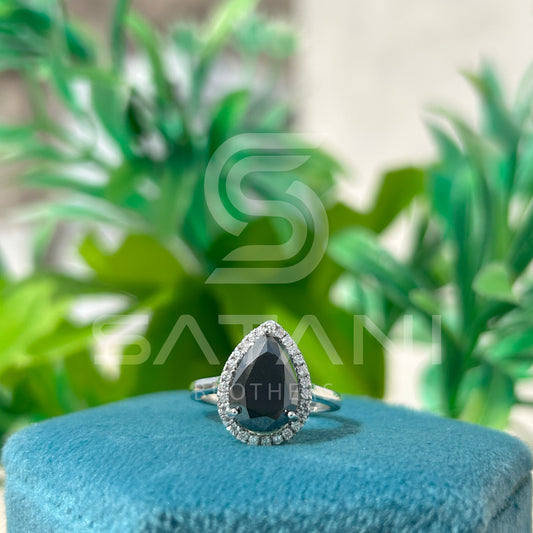 “Pear Shape Black Diamond Halo Engagement Ring in White Gold”