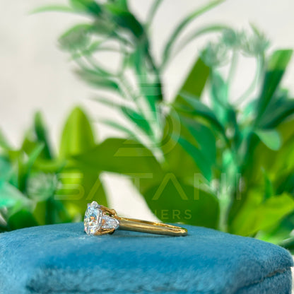 Round Brilliant Cut Diamond Engagement Ring with Baguette Side Stones