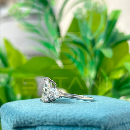 “Pear Shape Diamond Three Stone Engagement Ring with Oval Side Stones”
