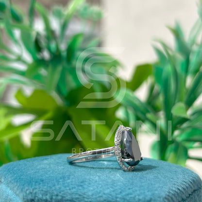 “Pear Shape Black Diamond Halo Engagement Ring in White Gold”