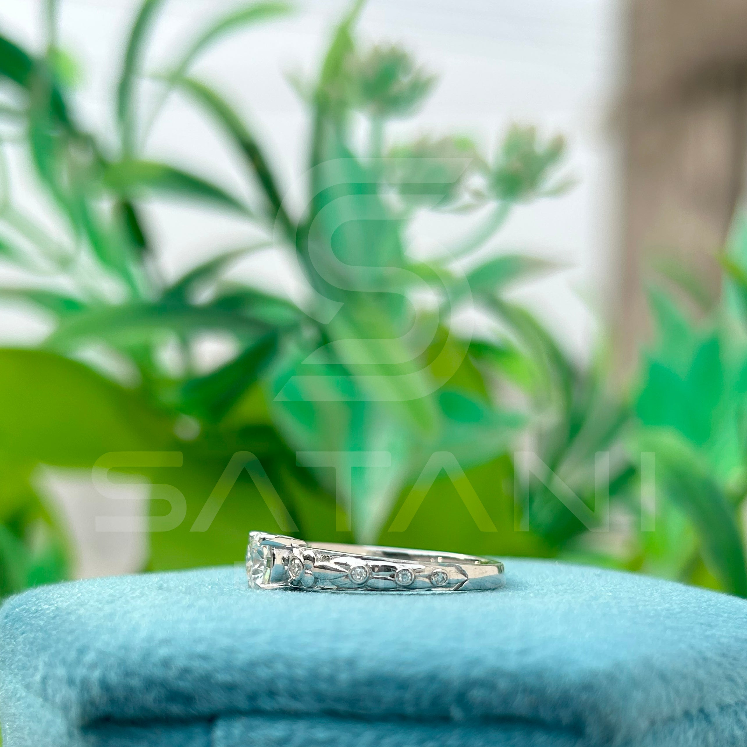 "Round Cut Solitaire Ring with Side Accents – Elegant Engagement Design"