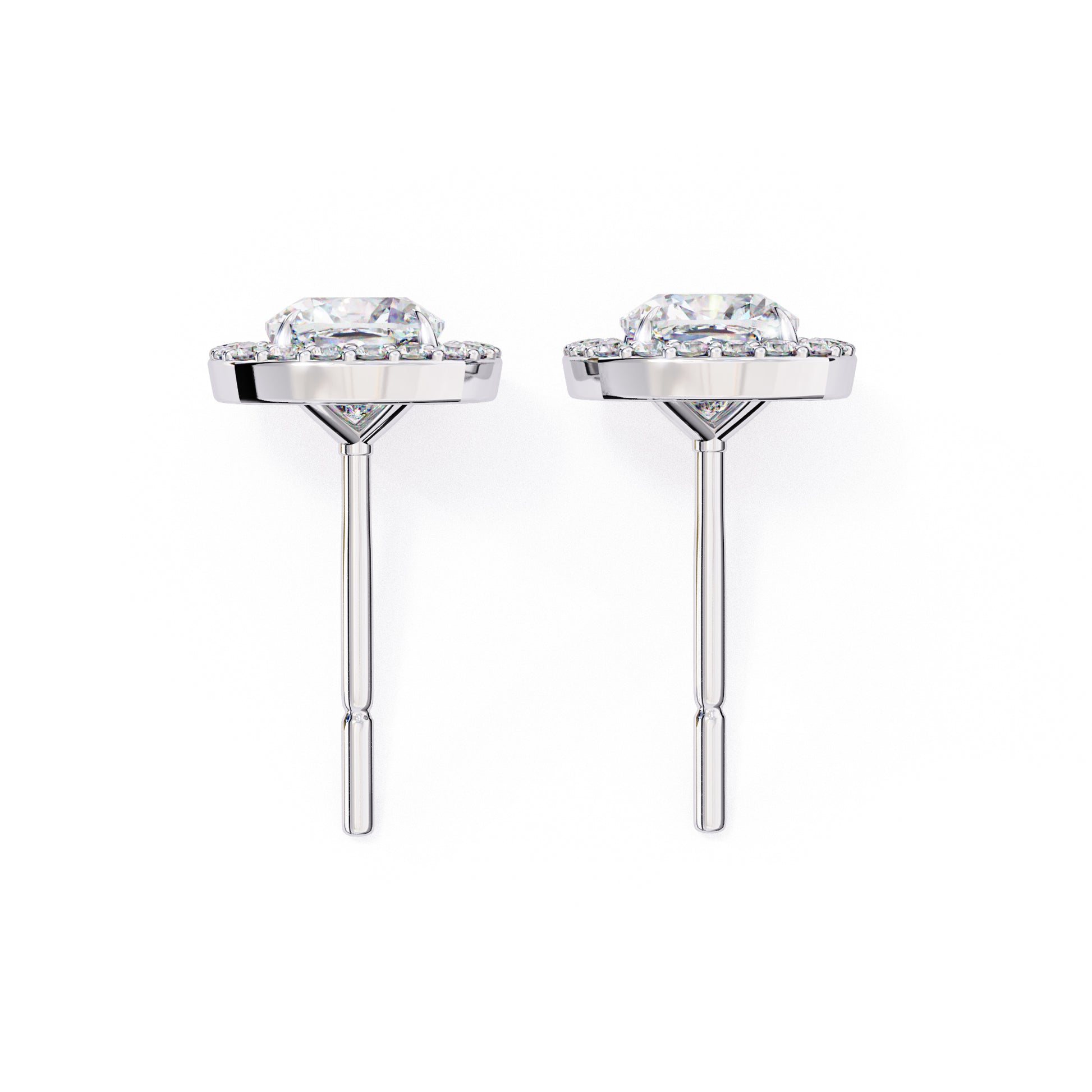 Pair of silver earrings with clear gemstones on a white background