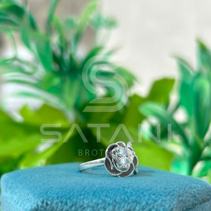 "Floral Bypass Diamond Ring – Adjustable Petal Design with Brilliant Round Center Stone"