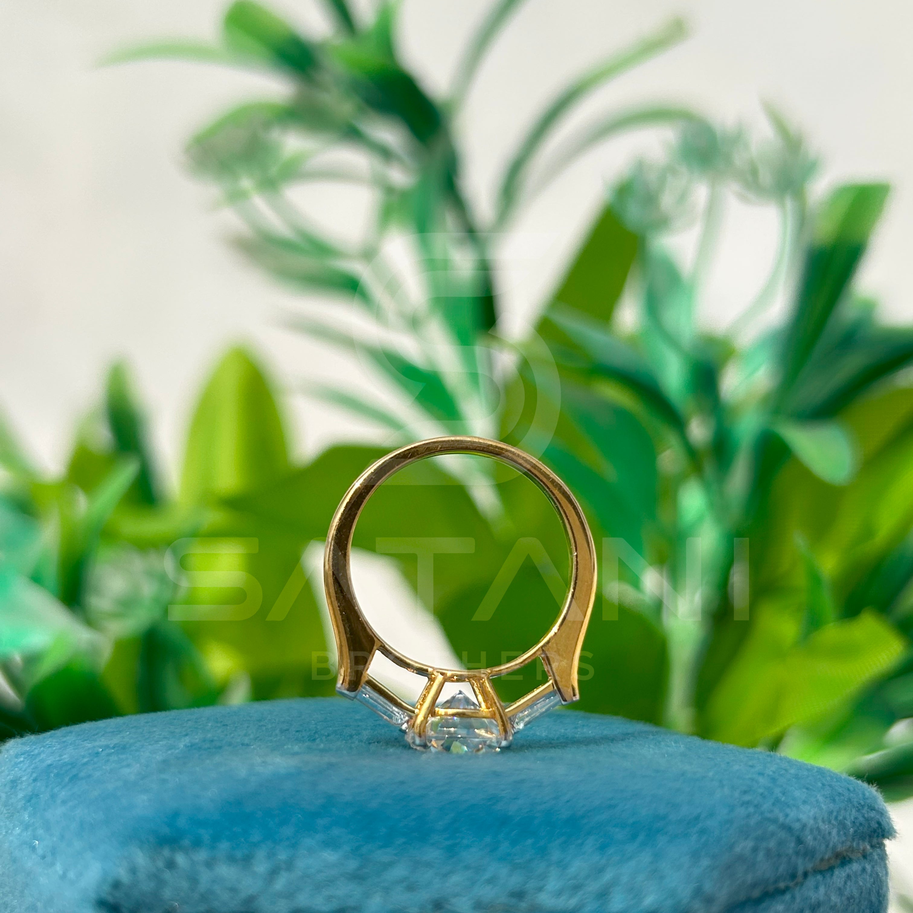 Round Brilliant Cut Diamond Engagement Ring with Baguette Side Stones