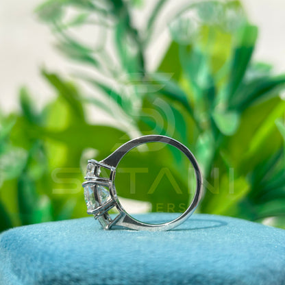 cushion Cut Diamond Three Stone Engagement Ring with Princess Cut Side Stones