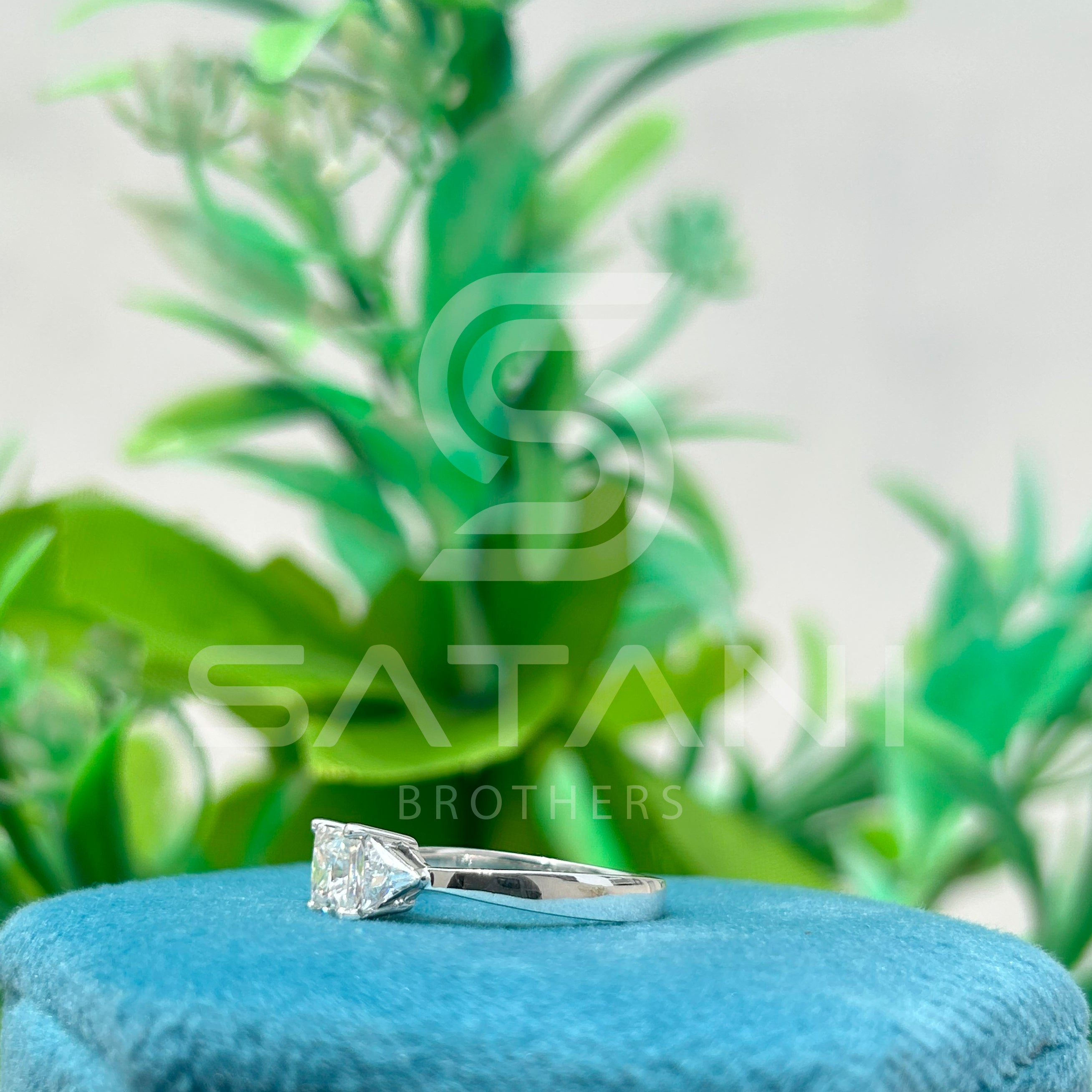 Princess Cut Diamond Three Stone Engagement Ring with Trillion Side Stones
