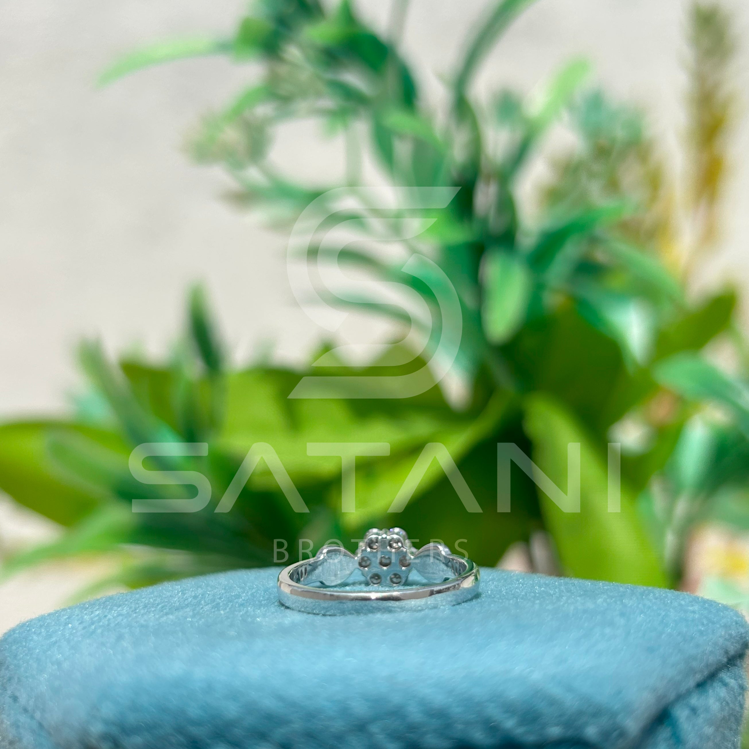 White Gold Diamond Cluster Ring with Twisted Shoulder Design – Elegant & Timeless