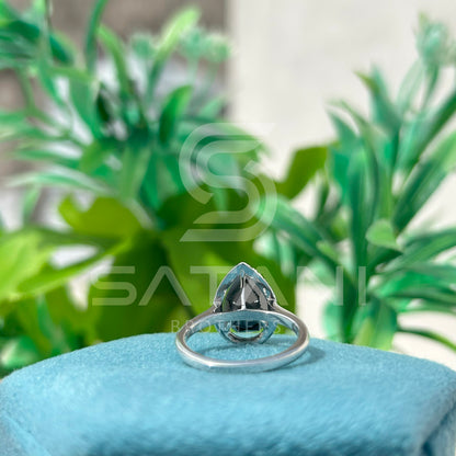 “Pear Shape Black Diamond Halo Engagement Ring in White Gold”