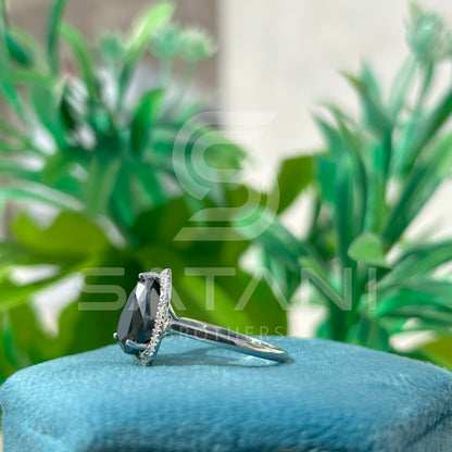“Pear Shape Black Diamond Halo Engagement Ring in White Gold”