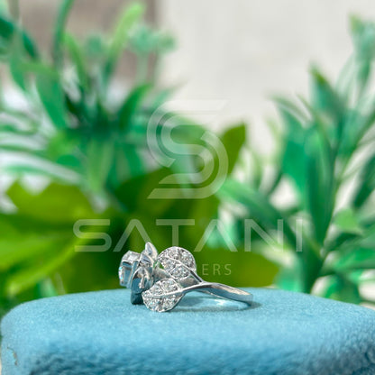 "Floral Bypass Diamond Ring – Adjustable Petal Design with Brilliant Round Center Stone"